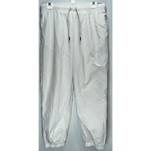 Nike cream swishy jogger pants size medium